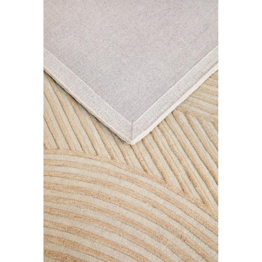 Summit Archie Beige Rug featuring subtle chevron corner pattern in cream, beige and taupe on light beige background, hand-tufted wool