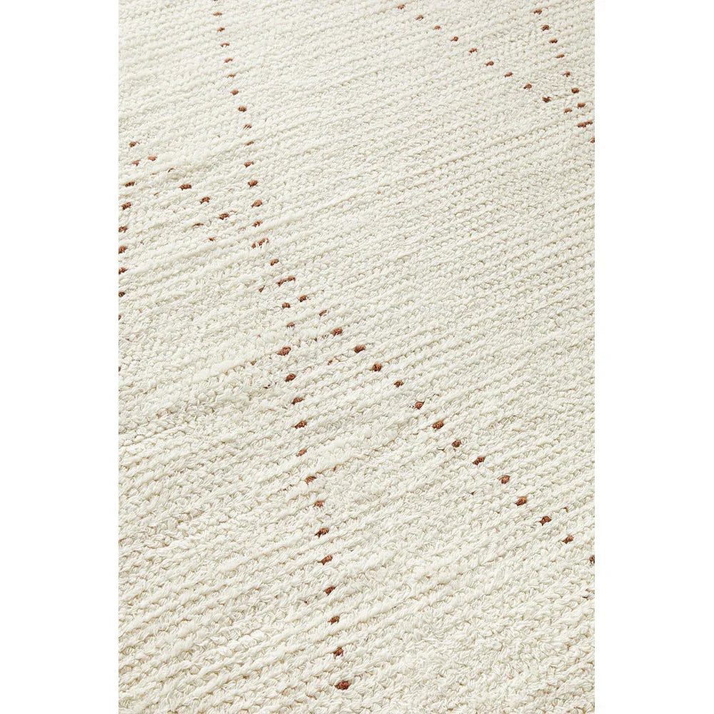 Summit Daina Natural rug featuring geometric dotted-line pattern in brown on cream background, hand-tufted wool