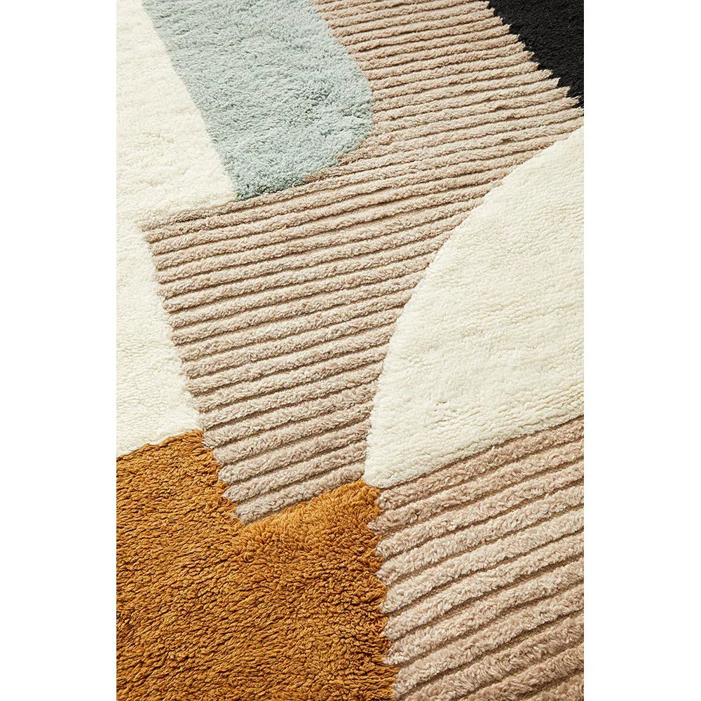 Summit Elroy Multi rug featuring abstract geometric patchwork in cream, beige, rust, sage green and black on cream background, hand-tufted wool