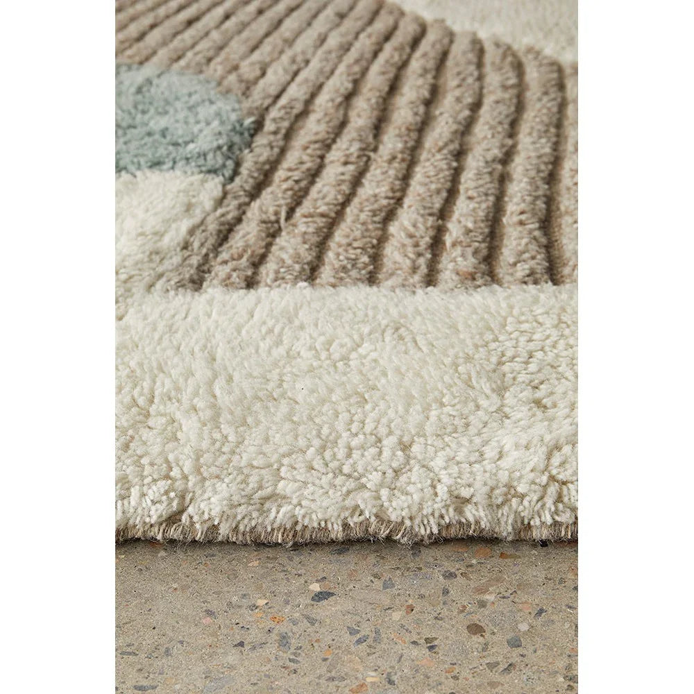 Summit Elroy Multi rug featuring chunky shag with striped ribbed pattern in cream, taupe and grey on ivory background, hand-tufted wool
