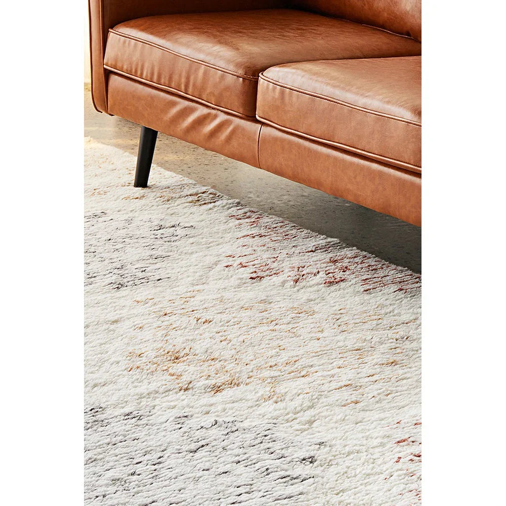 Summit Motif Cream rug featuring abstract shag pattern in cream, ivory, beige, charcoal & rust on cream background, hand-tufted wool