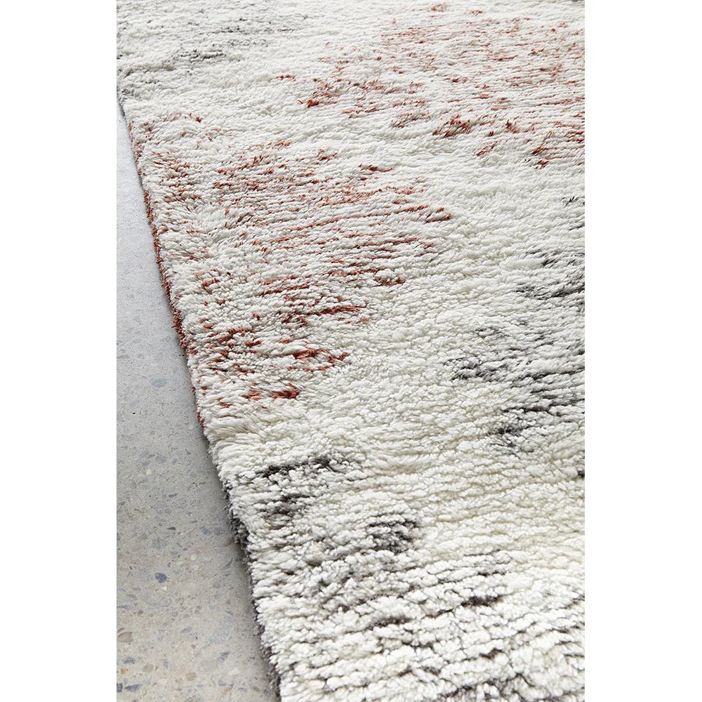 Summit Motif Cream rug featuring abstract textured pattern in cream, ivory, taupe and brown on cream background, hand-tufted construction