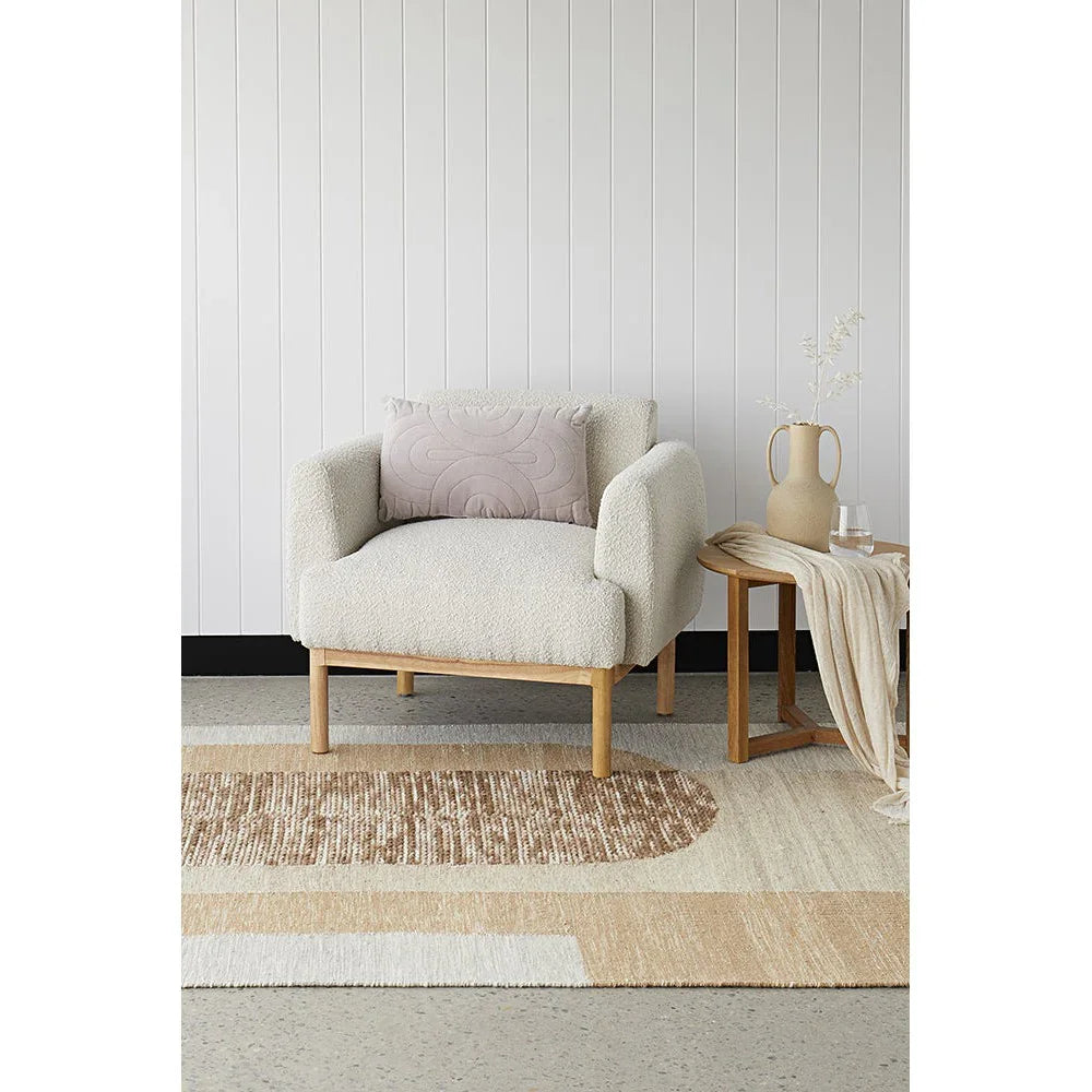 Summit Orb Toffee rug featuring circular orb motif in cream, beige and tan on light beige background, hand-tufted wool