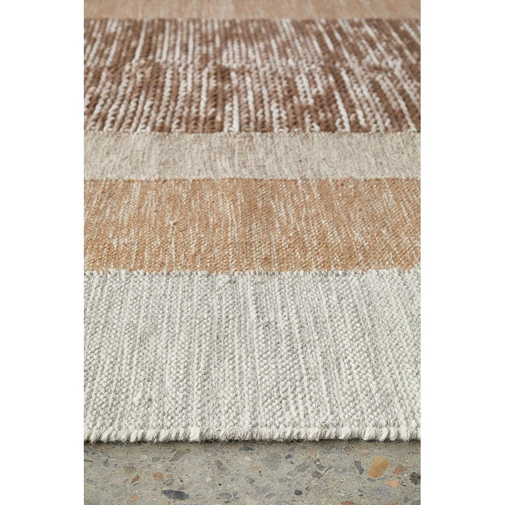 Summit Orb Toffee rug featuring striped block pattern in toffee brown, taupe and cream on ivory background, handwoven wool