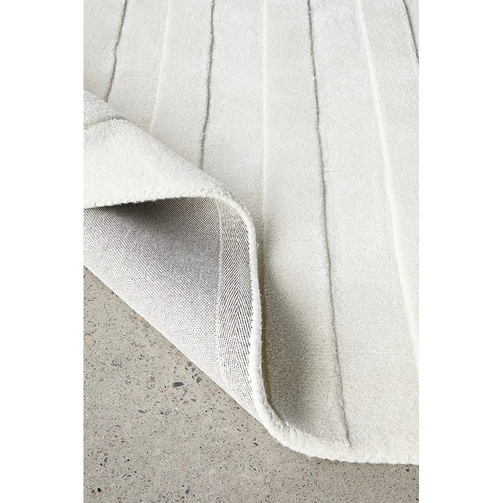Summit Rug by Rug Culture featuring striped pattern in ivory and cream on white background, hand-tufted wool