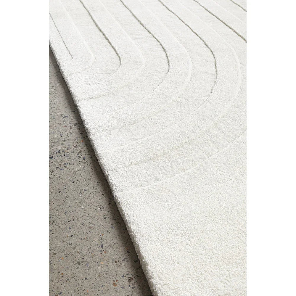 Summit Trail White rug featuring curved-line pattern in white and cream on ivory background, machine-made wool