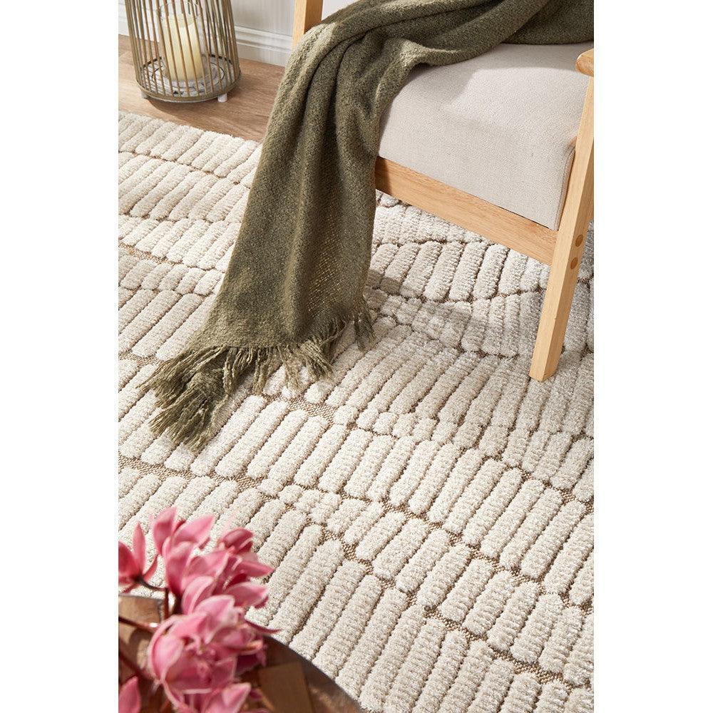 Villa Fossil Cream Rug featuring textured ribbed pattern in cream and ivory on soft cream background, hand-tufted wool