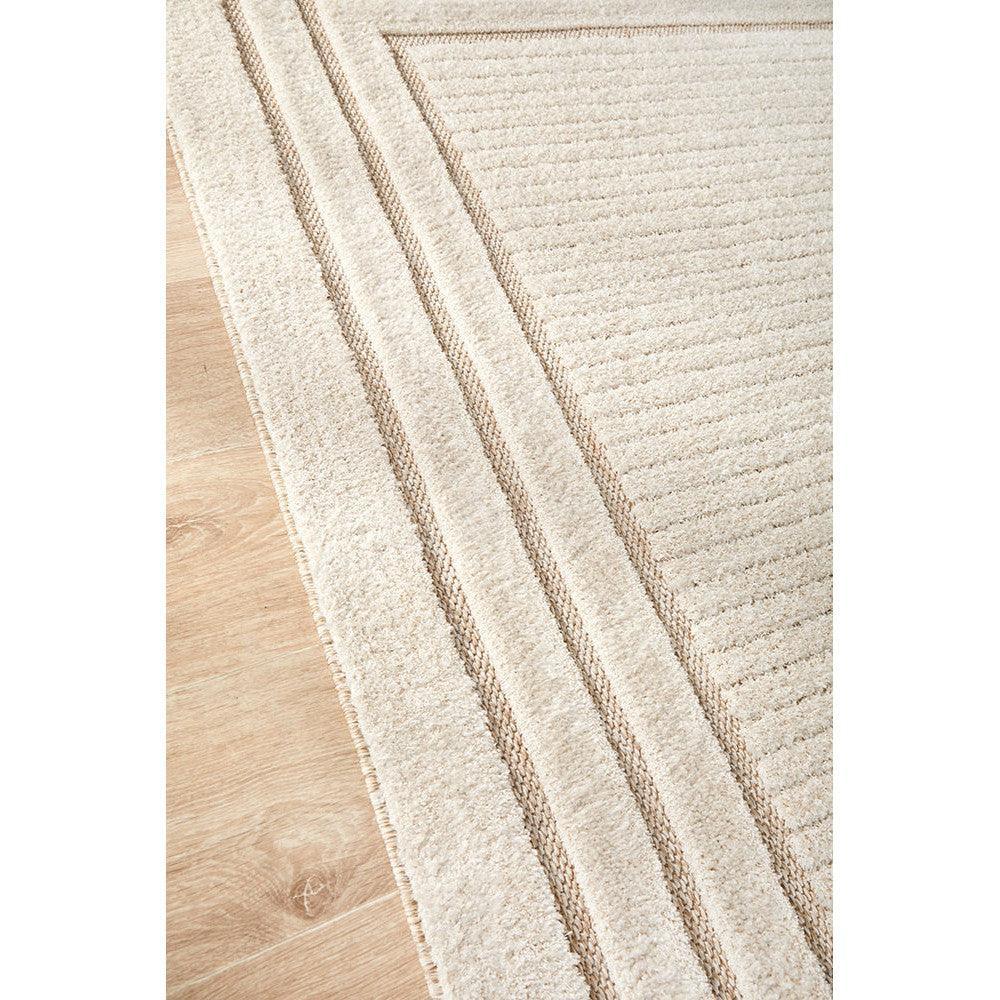 Villa Marin Snow Rug featuring striped pattern in ivory, cream and taupe on warm beige background, hand-tufted wool