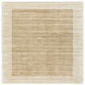 Asiatic Blade Border Putty Champagne Square square rug styled in a living room
