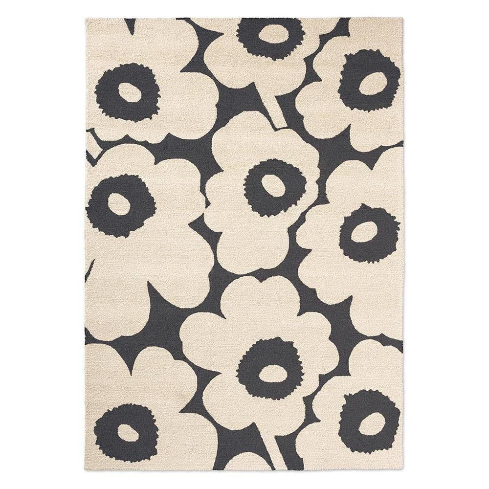 ICONIC RUGS Marimekko Unikko charcoal and ivory floral outdoor rug, handtufted recycled PET, 11mm pile.