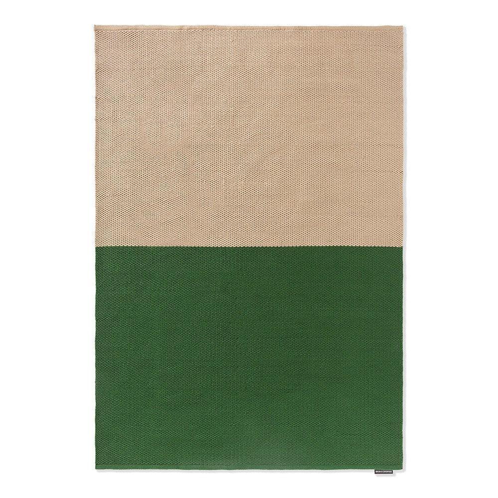 Brink & Campman Deck Spring Green Outdoor Designer Rug featuring two-tone block pattern in tan and deep green on light background, flatweave outdoor rug, synthetic fibers
