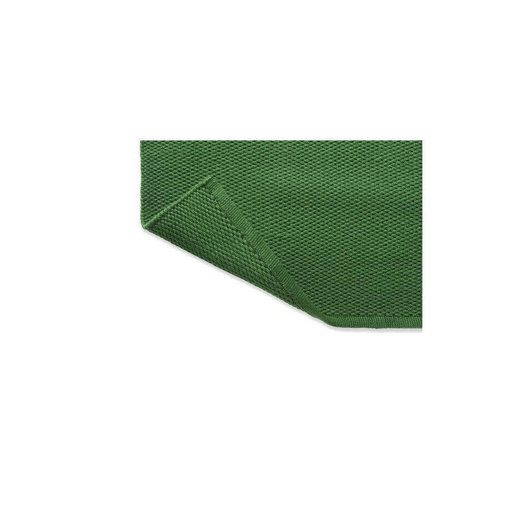 Brink & Campman Deck Spring Green Outdoor Rug featuring textured solid weave in spring green on white background, machine-loomed polypropylene