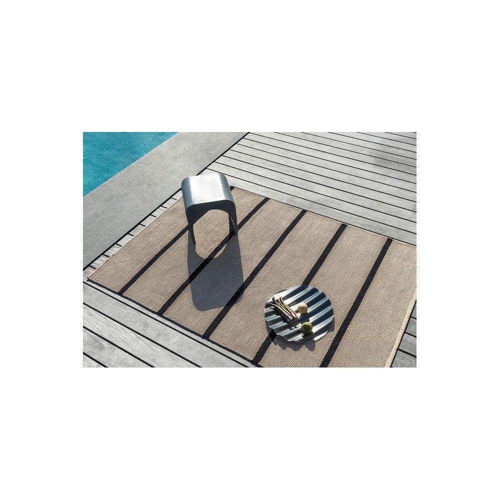 Brink & Campman Deck Charcoal Black outdoor rug featuring beige-brown striped pattern on gray decking, power-loomed polypropylene