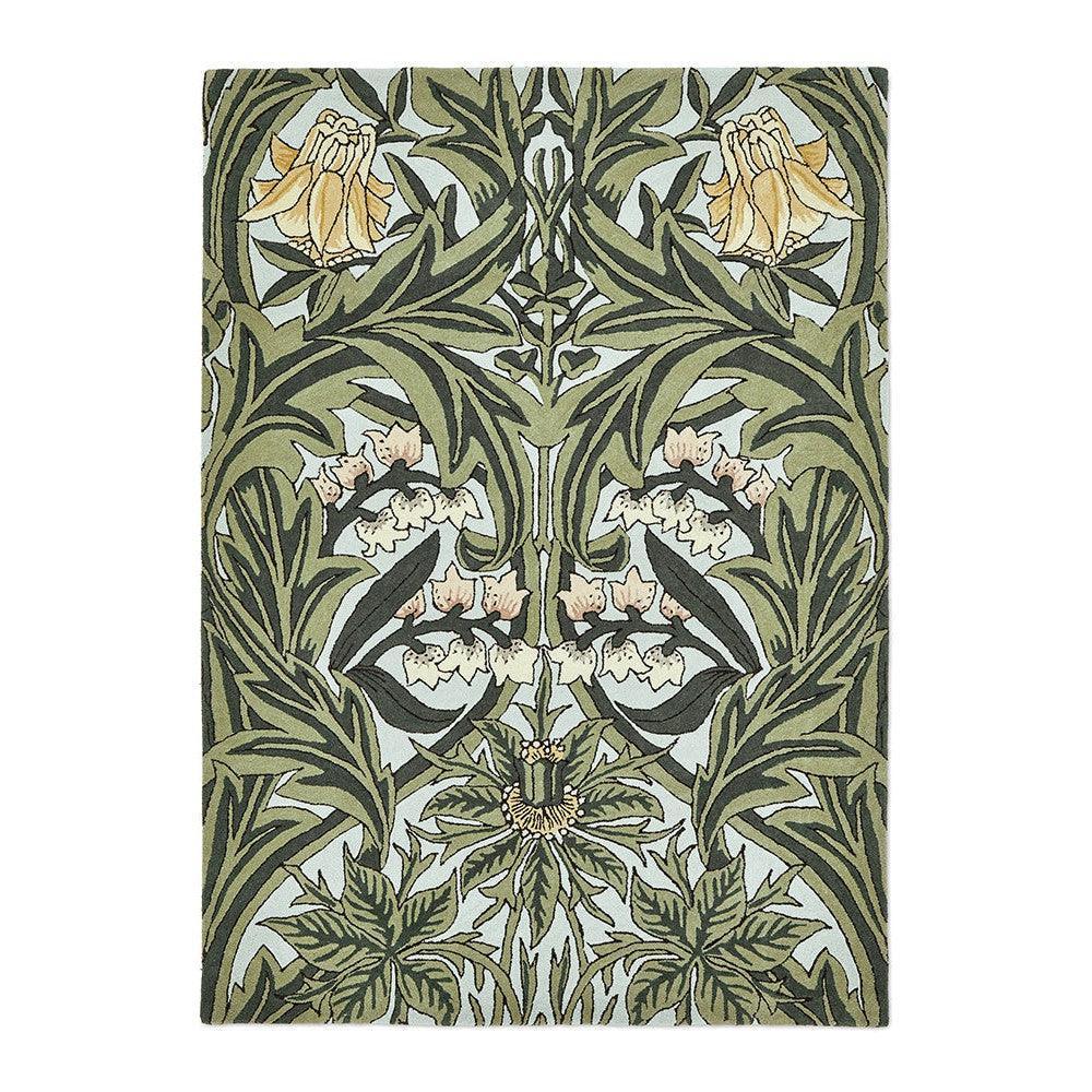 Morris & Co Bluebell Leafy Arbour Green Designer Rug featuring botanical leaves in olive, sage and cream on pale blue, hand-tufted wool