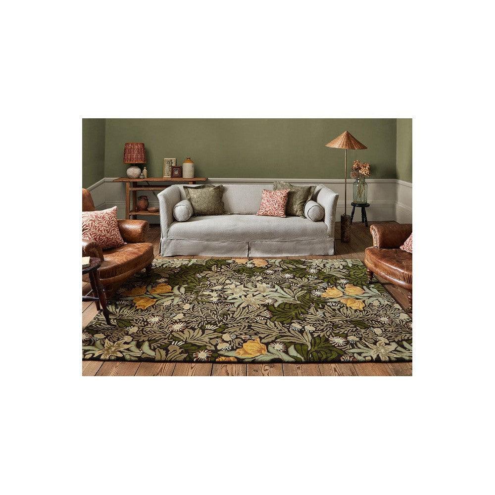 Morris & Co Bower Twining Vine Green Designer Rug featuring botanical floral pattern in olive green, sage, mustard yellow and cream on green background, hand-tufted wool