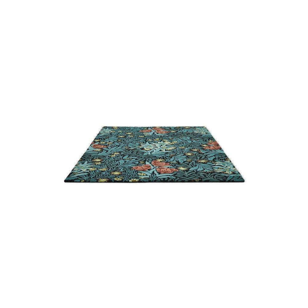 Morris & Co Bower Indigo Rug featuring botanical floral pattern in indigo/teal with coral accents on teal background, hand-tufted wool