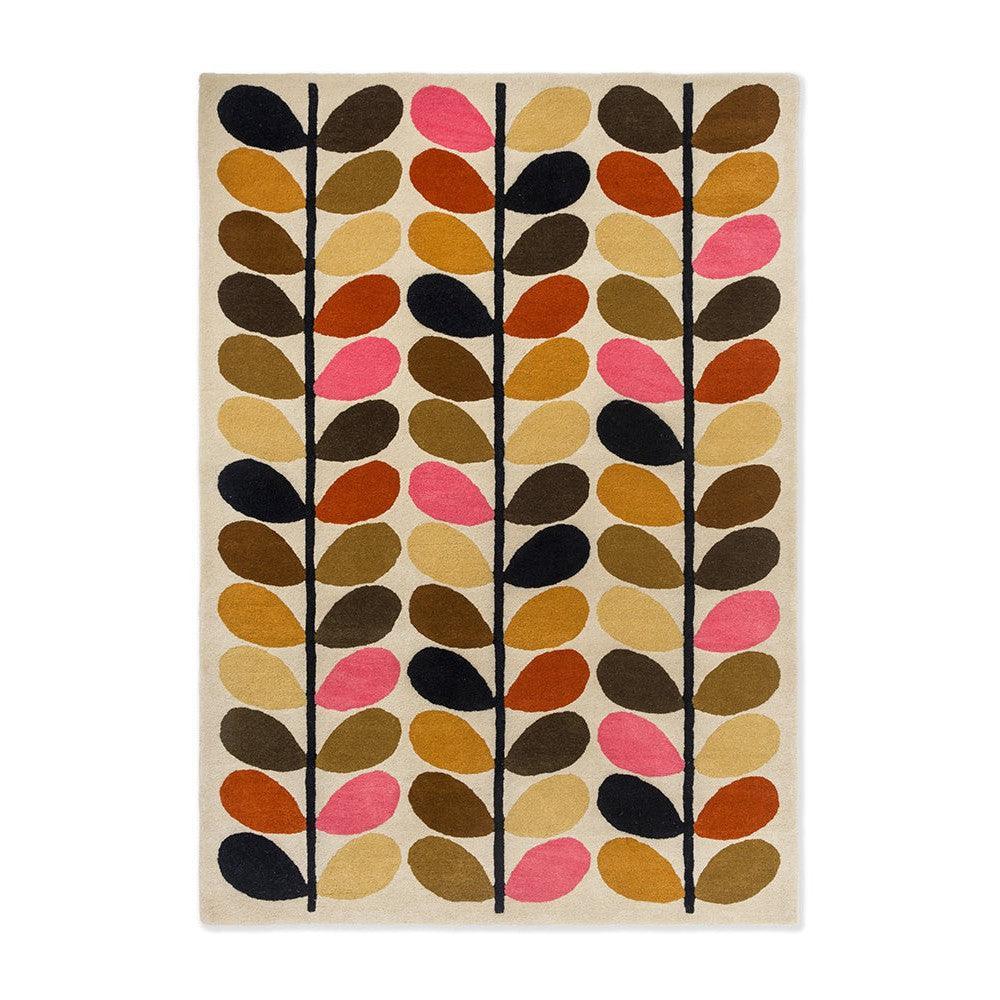 Orla Kiely Multi Stem Autumn Rug featuring leaf-branch pattern in pink, mustard, olive, brown and black on cream, machine-woven wool