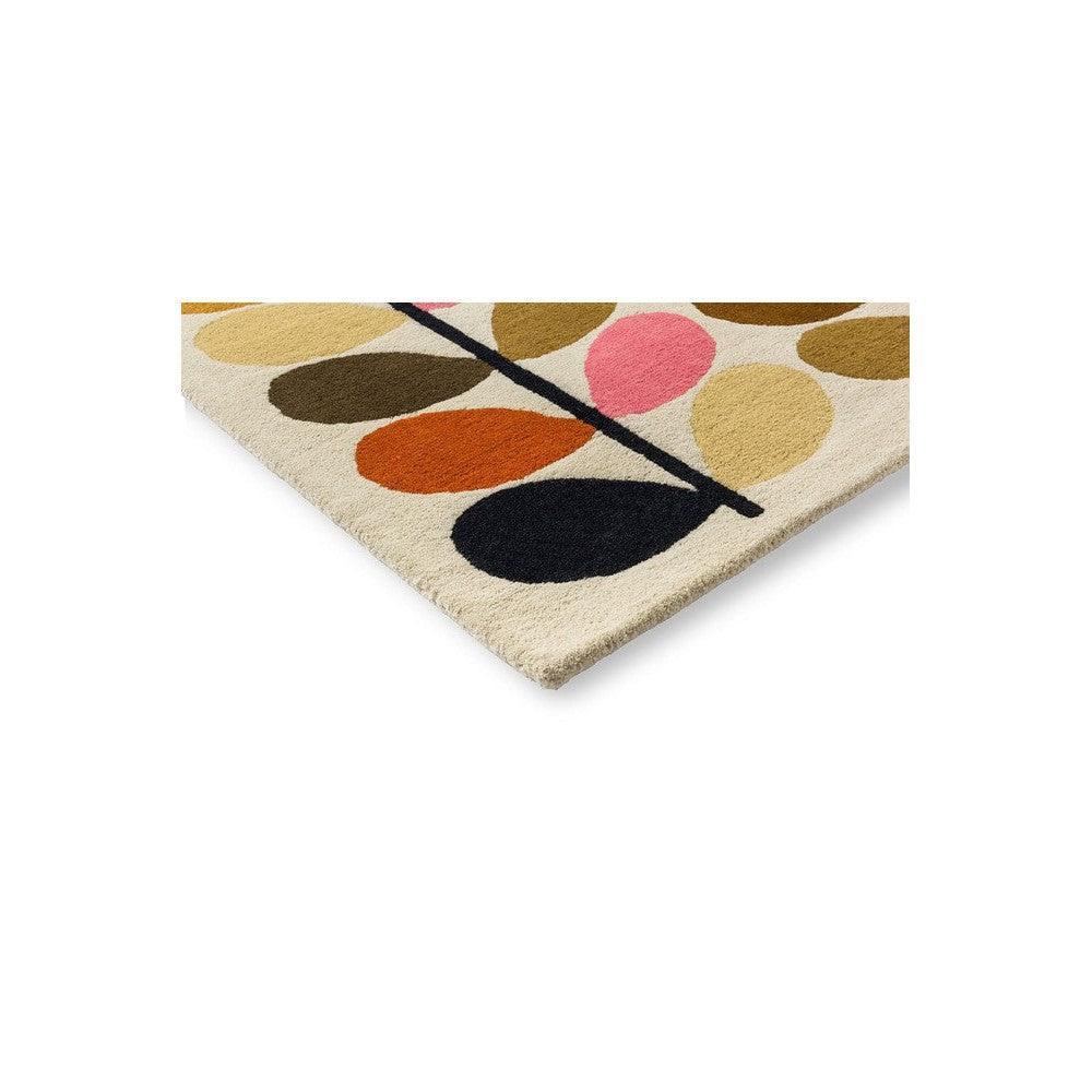 Orla Kiely Multi Stem Autumn Designer Rug featuring abstract stem pattern in cream, mustard, olive, brown, pink and orange on ivory, hand-tufted wool