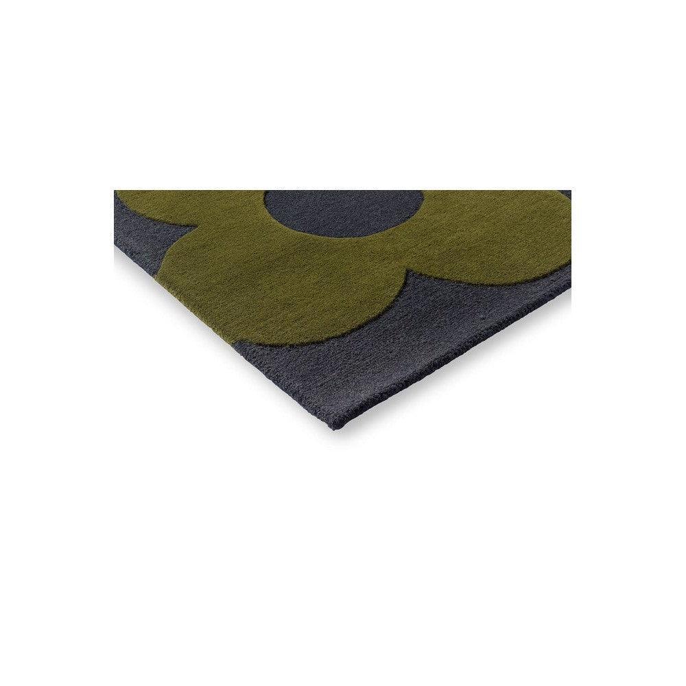 Orla Kiely Sprig Stem Marine Designer Rug featuring floral pattern in olive green and navy on navy background, hand-tufted wool