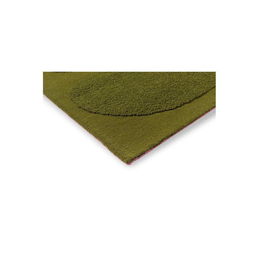 Orla Kiely Solid Stem Fern Designer Rug featuring circular motif in olive green with pink edge on white, hand-tufted wool