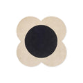 Orla Kiely Flower Spot rug featuring flower-shaped pattern in ecru beige and black on cream background, hand-tufted wool