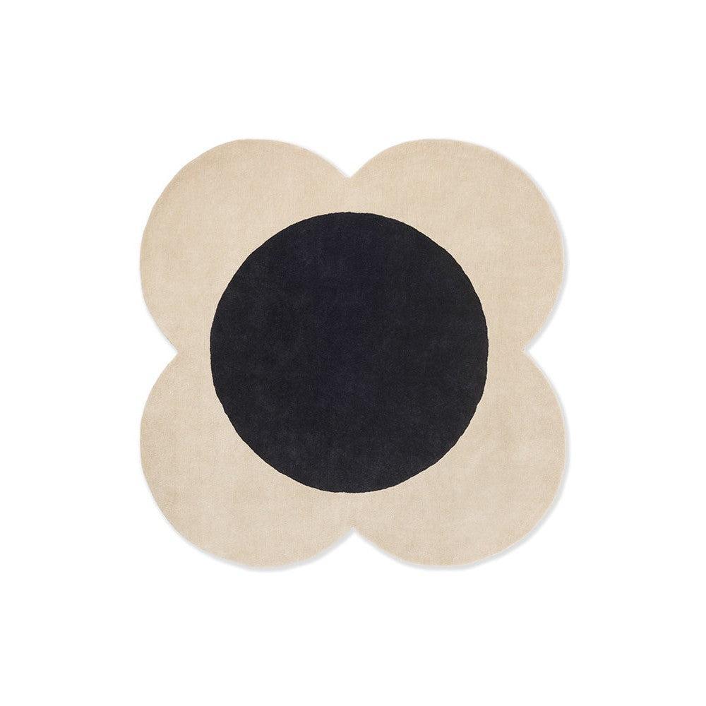 Orla Kiely Flower Spot rug featuring flower-shaped pattern in ecru beige and black on cream background, hand-tufted wool