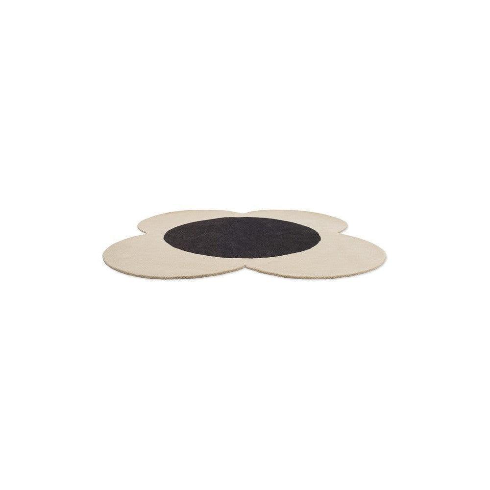 Orla Kiely Flower Spot rug featuring flower-shaped pattern in ecru/beige and black on cream background, hand-tufted wool
