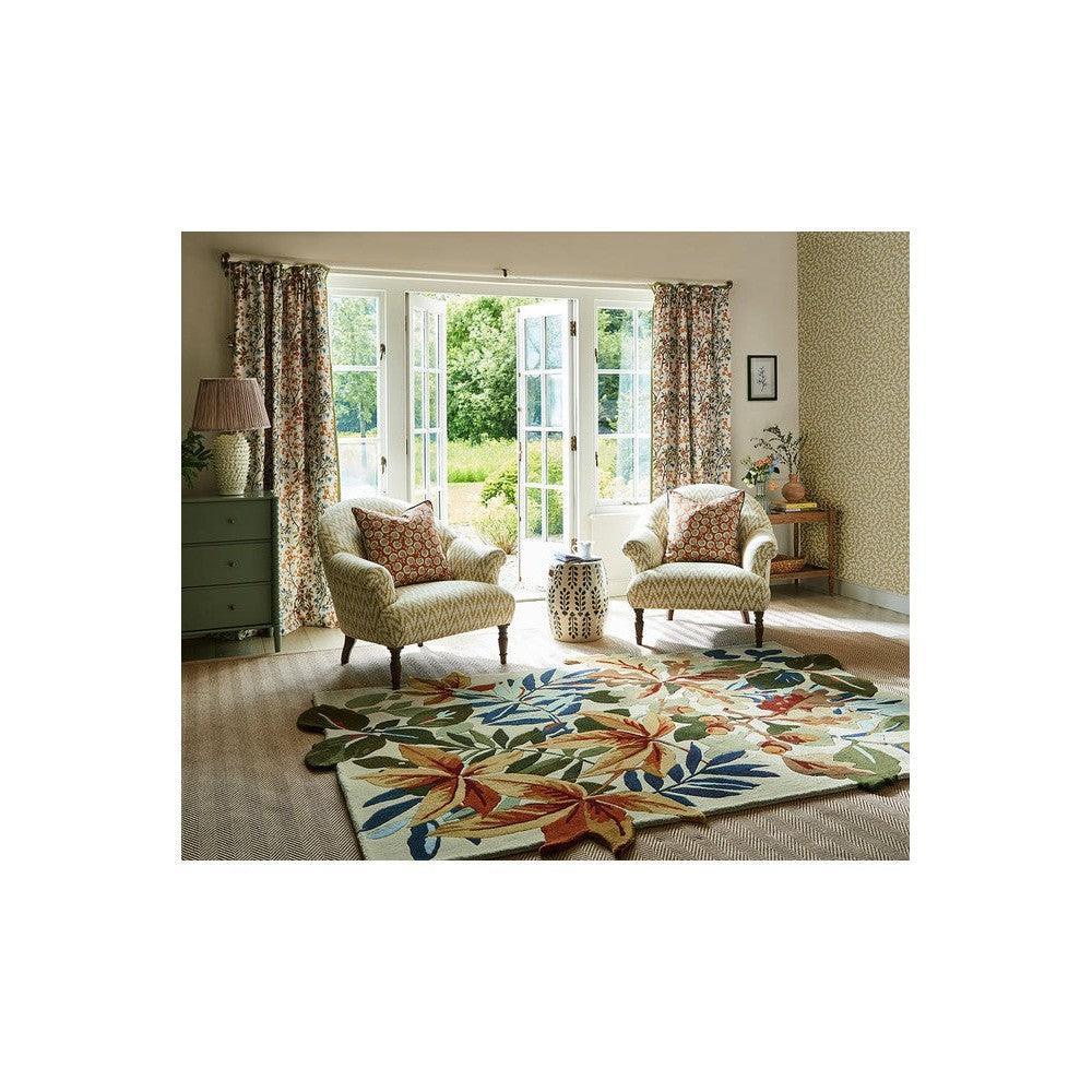Sanderson Robin's Wood Russet Brown Designer Rug featuring botanical floral pattern in russet, emerald, teal, cream on ivory, hand-tufted wool