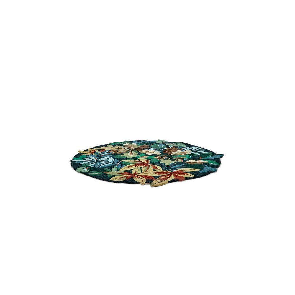 Sanderson Robin's Wood Round Rug with tropical leaf pattern in forest green, emerald and teal on dark navy background, machine-made wool