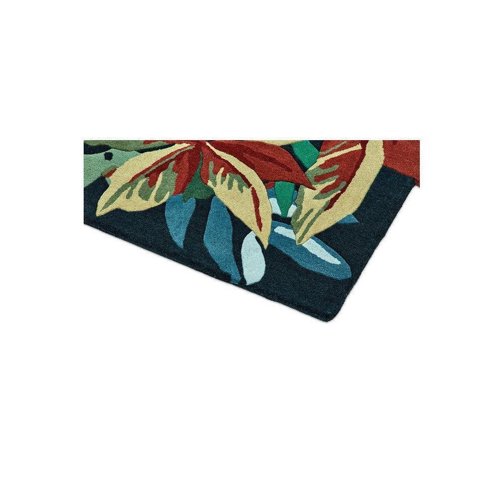 Sanderson Robin's Wood Forest Green Designer Rug featuring botanical leaf pattern in forest green, olive, teal, navy on dark blue background, hand-tufted wool