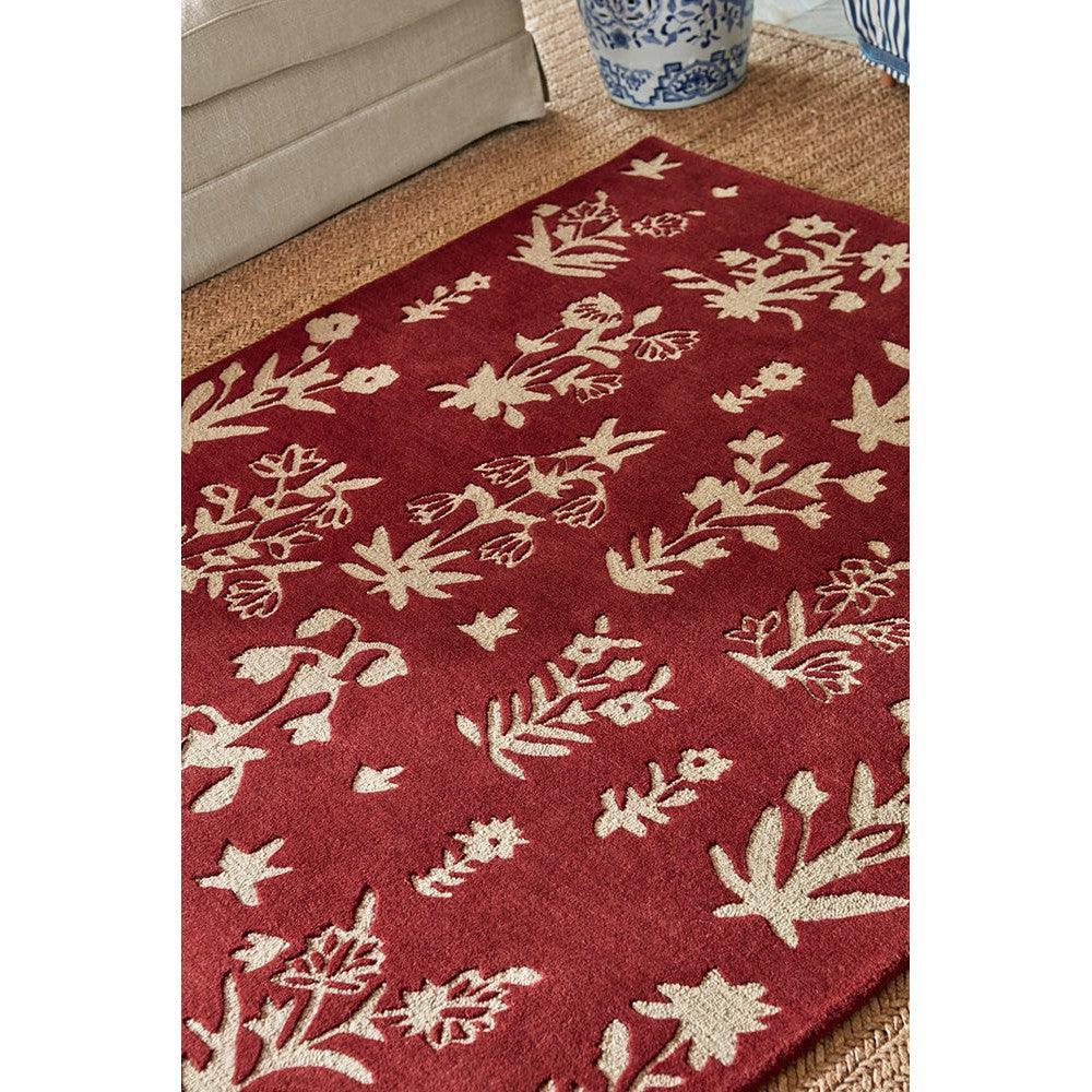 Sanderson Woodland Glade Damson Red Designer Rug featuring botanical floral pattern in damson red and ivory on deep red background, hand-tufted wool