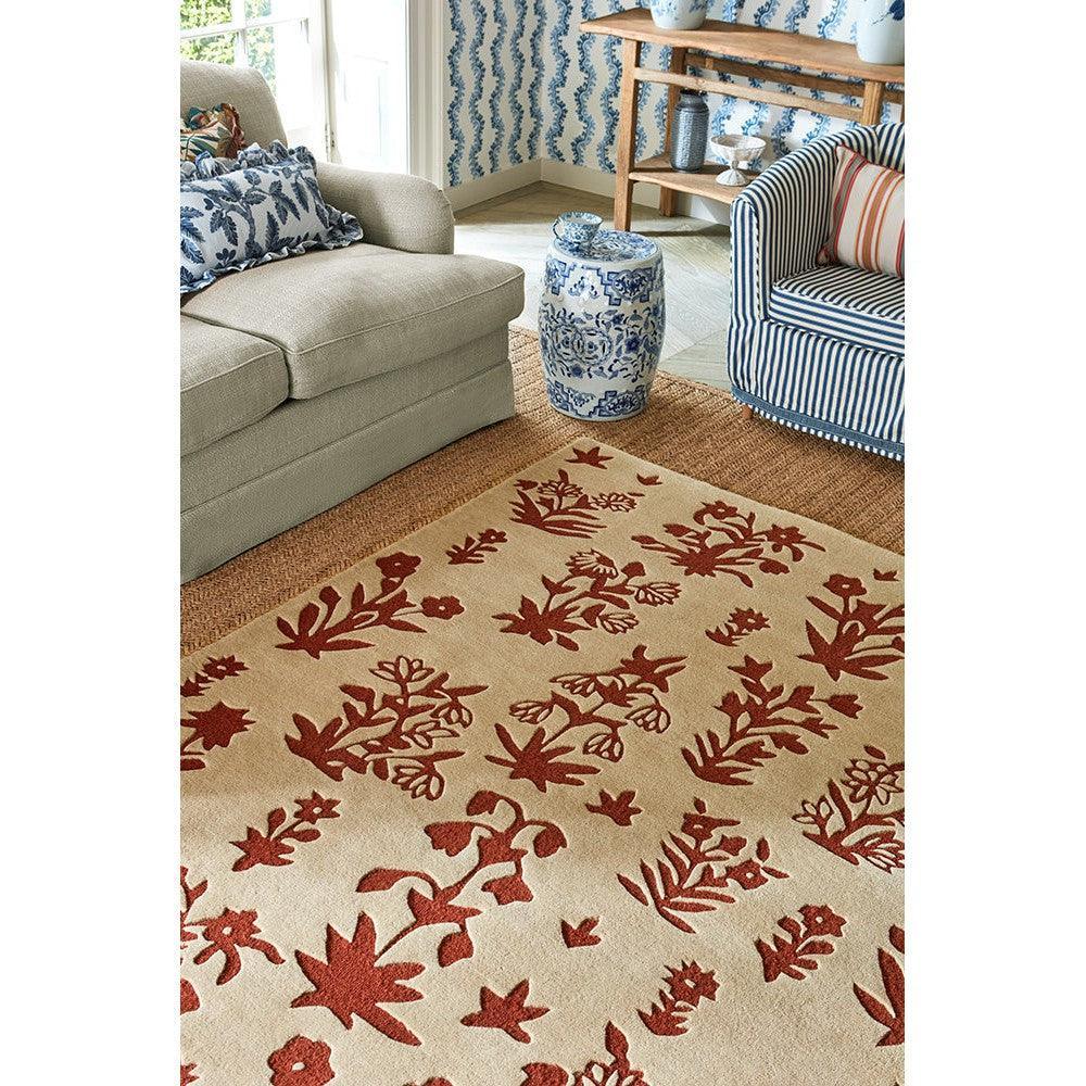 Sanderson Woodland Glade Rug featuring botanical floral pattern in linen and russet on beige background, handmade wool