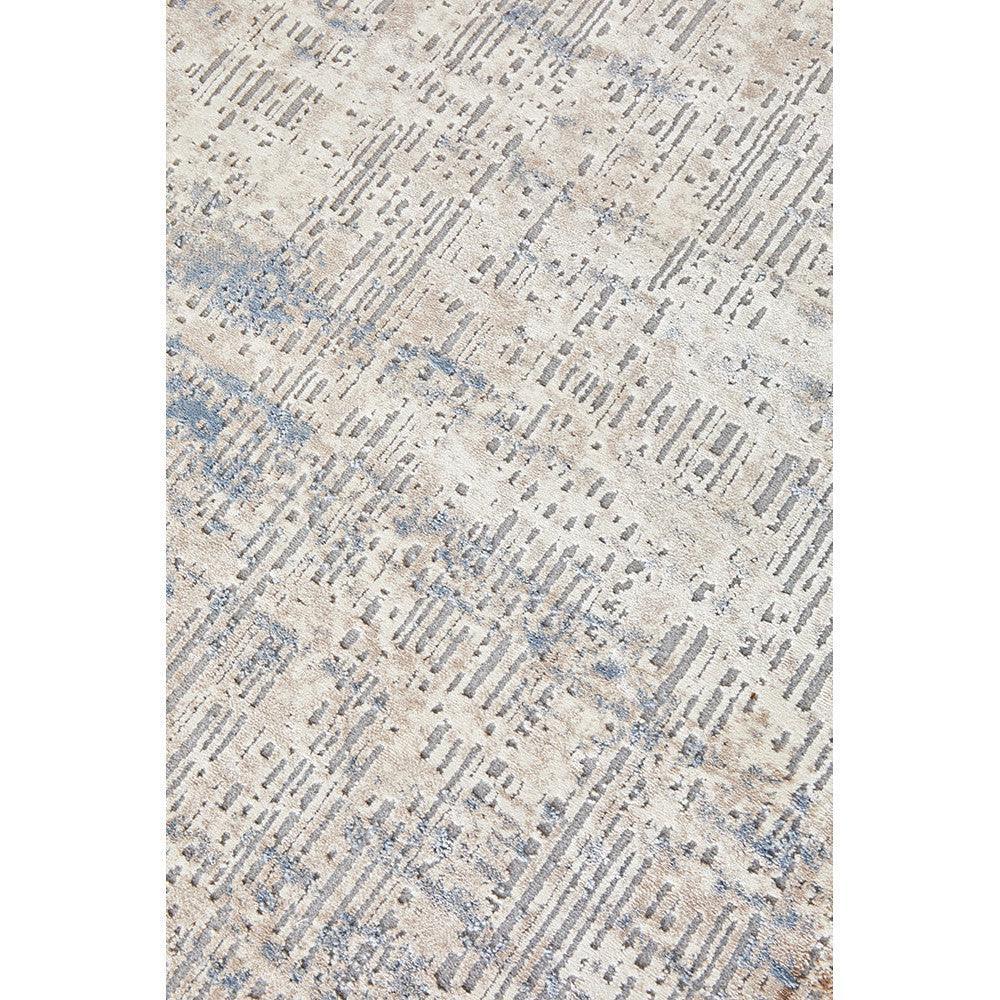 Bronte Nola Powder Rug featuring abstract distressed linear pattern in beige, taupe and powder blue on cream background, hand-tufted wool