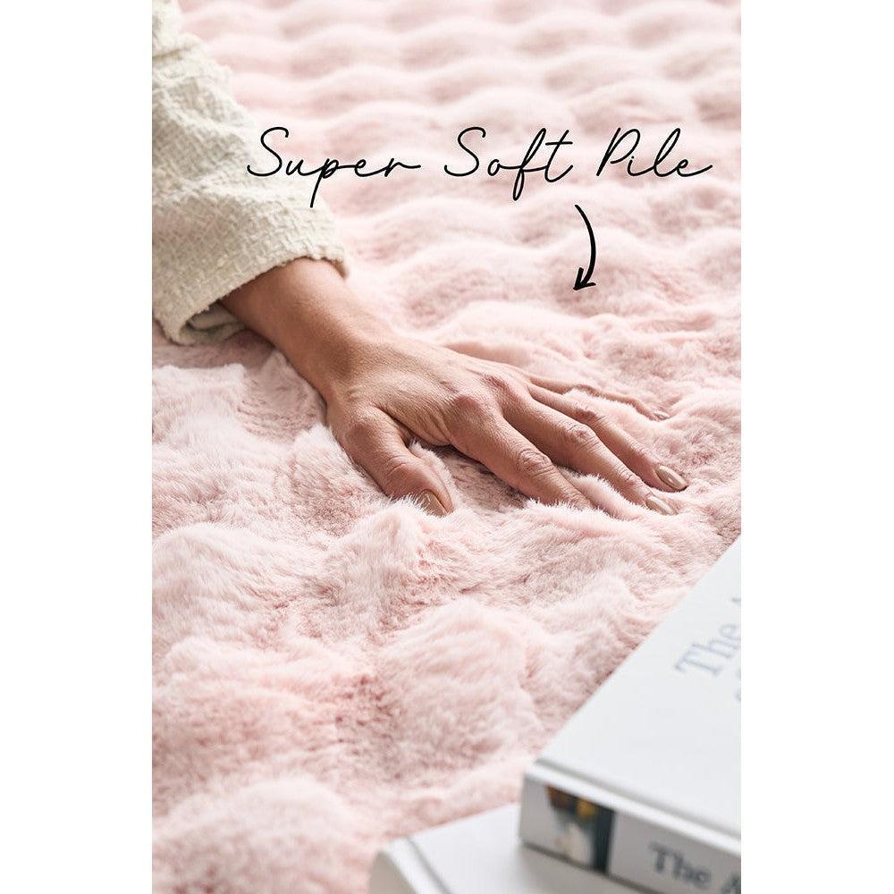Bubble Blush Round rug featuring plush soft pile in blush pink on pale pink background, machine-washable Rug Culture