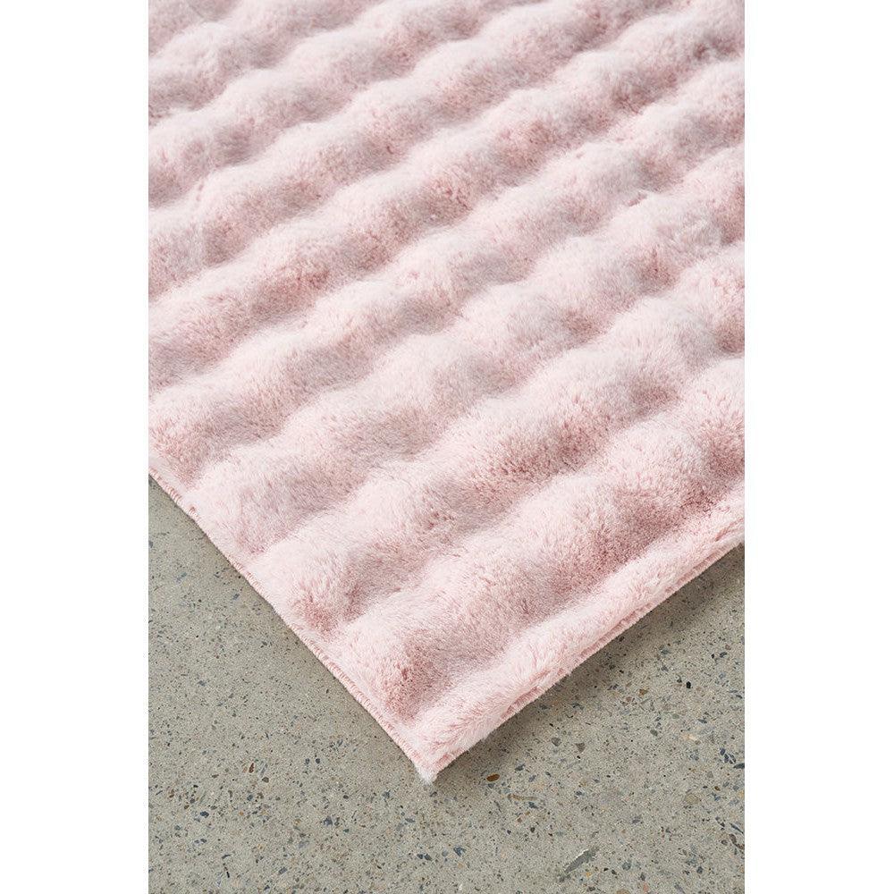 Bubble Blush machine-washable rug featuring bubble texture in blush pink on pale pink background, Rug Culture