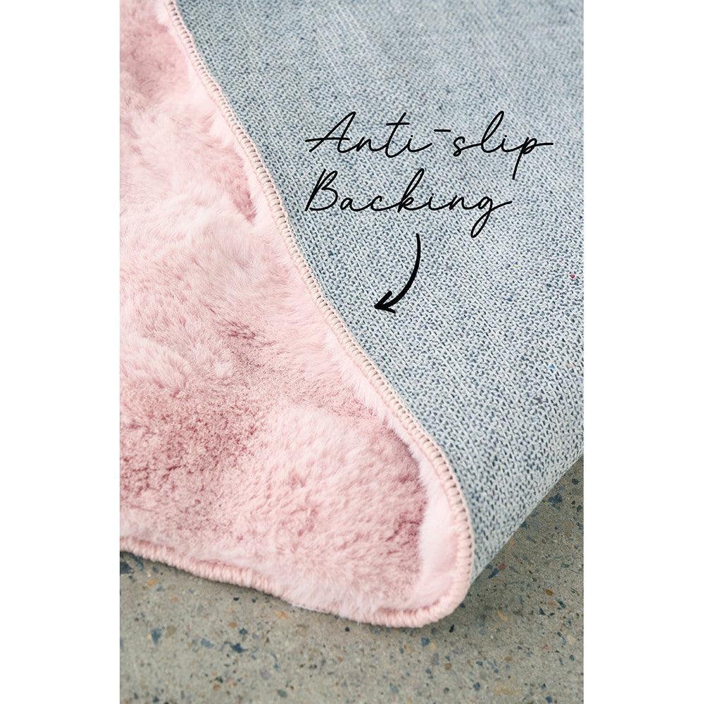 Bubble Blush - Machine Washable Rug featuring soft pink plush and blue anti-slip backing