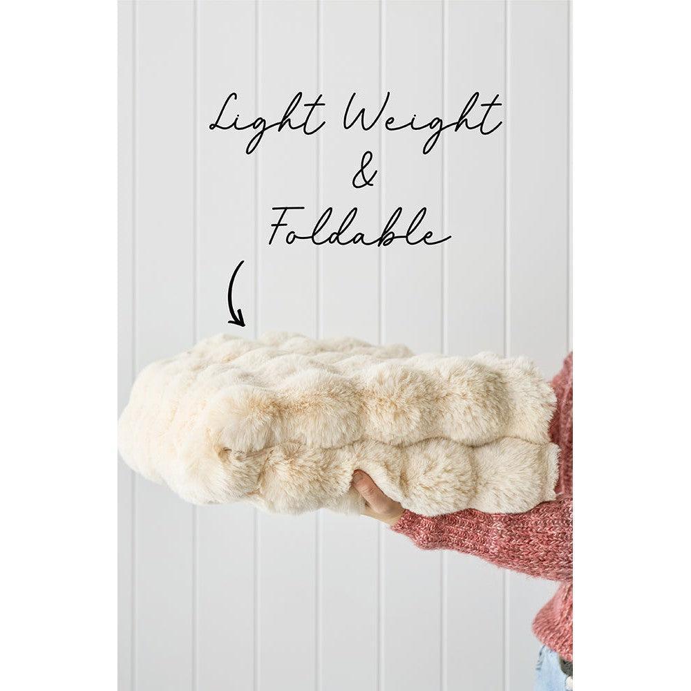 Bubble Natural Round rug featuring plush bubble pattern in ivory, cream and beige on white background, machine-washable polyester by Rug Culture