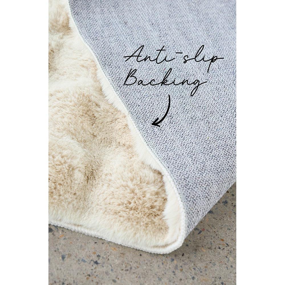 Bubble Natural rug by Rug Culture featuring plush bubble texture in pale blue-grey with cream anti-slip backing on concrete floor