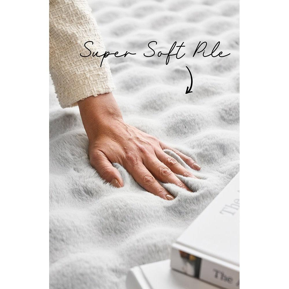Bubble Silver rug featuring fluffy bubble pile in silver, grey and white on pale background, machine-washable synthetics