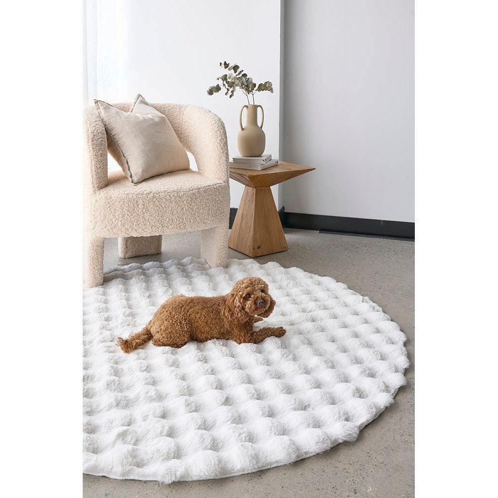 Bubble White Round Rug featuring bubble texture in bright white on light-grey floor, machine-washable rug