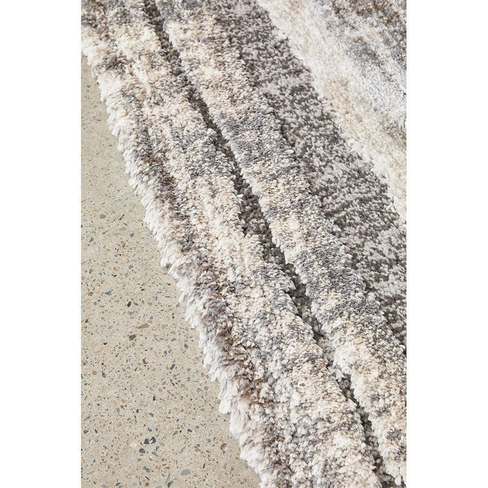 Himali Baley Slate Rug featuring shaggy striped pattern in cream, beige and taupe on light background, wool blend