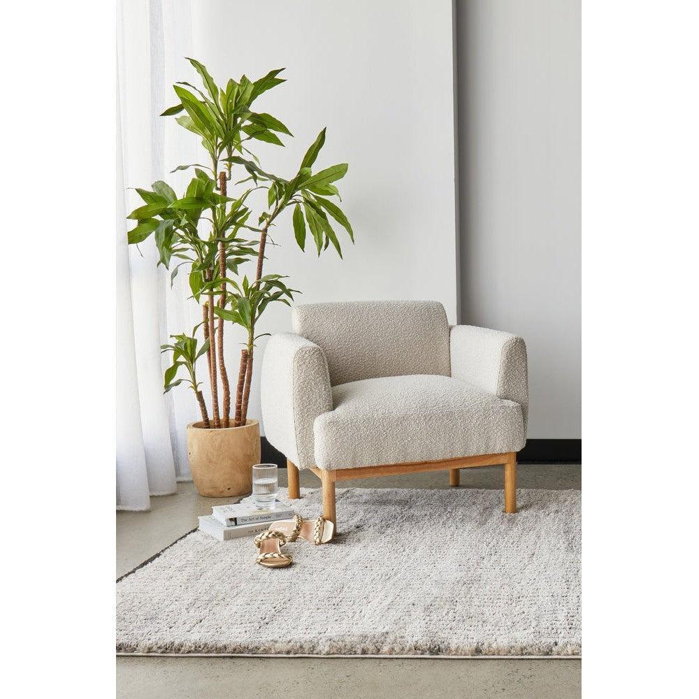 Himali Charlie Pewter Rug featuring textured solid weave in pewter grey on light cream background, hand-tufted wool