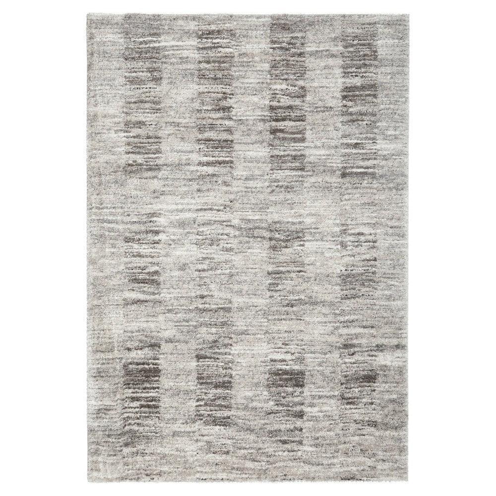 Himali Fin Rug featuring abstract striped pattern in steel grey, charcoal and taupe on pale beige background, machine-made wool blend