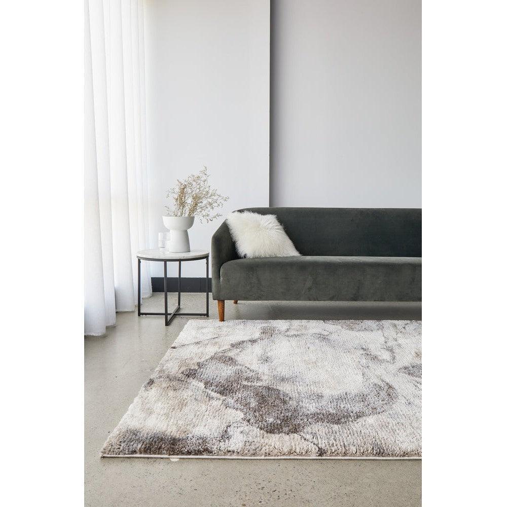 Himali Pedro Storm Rug featuring abstract distressed pattern in taupe, charcoal, cream on ivory background, hand-tufted wool
