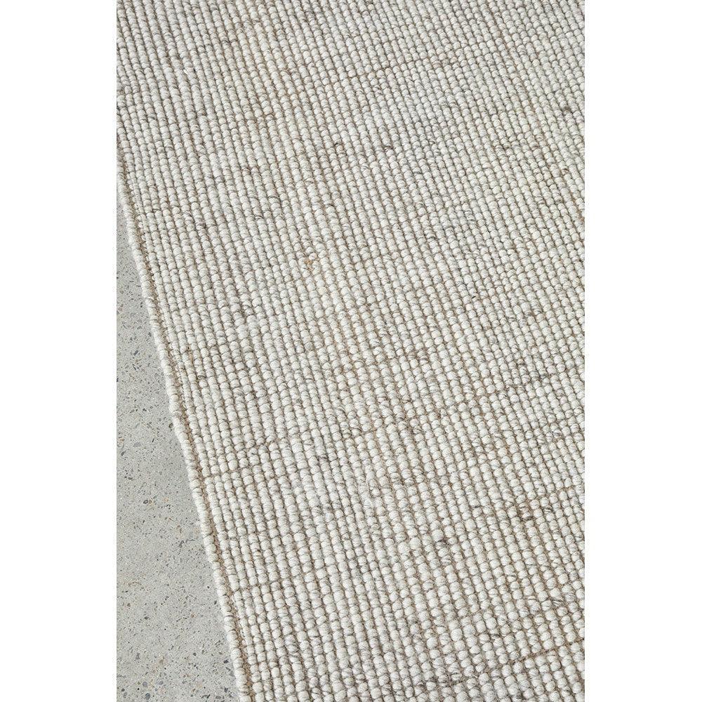 Harlow Ariel Beige Rug featuring textured striped loop-pile in beige and ivory on ivory background, hand-tufted wool