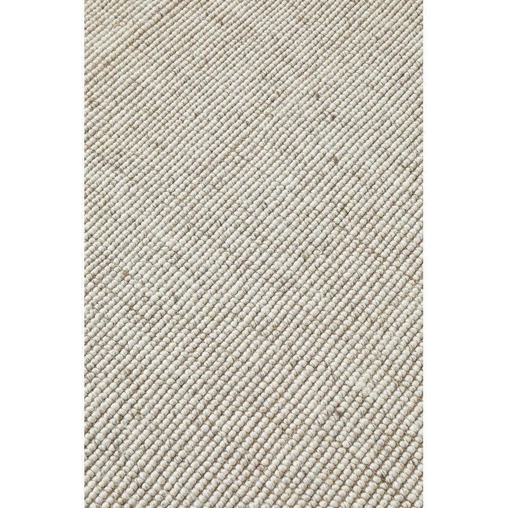 Harlow Ariel Beige Rug featuring textured diagonal loop pattern in beige and cream on ivory background, hand-woven wool