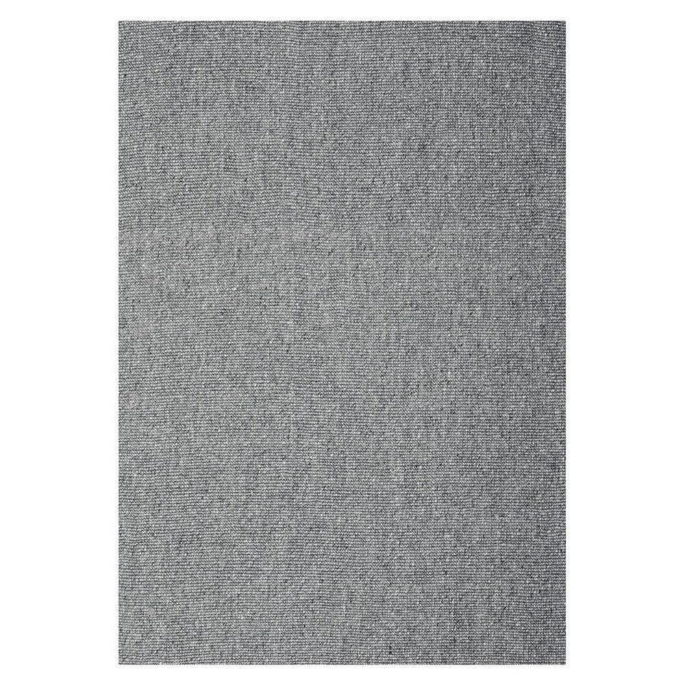 Harlow Ariel Graphite Rug featuring solid textured weave in graphite, charcoal and light grey on white background, hand-tufted wool
