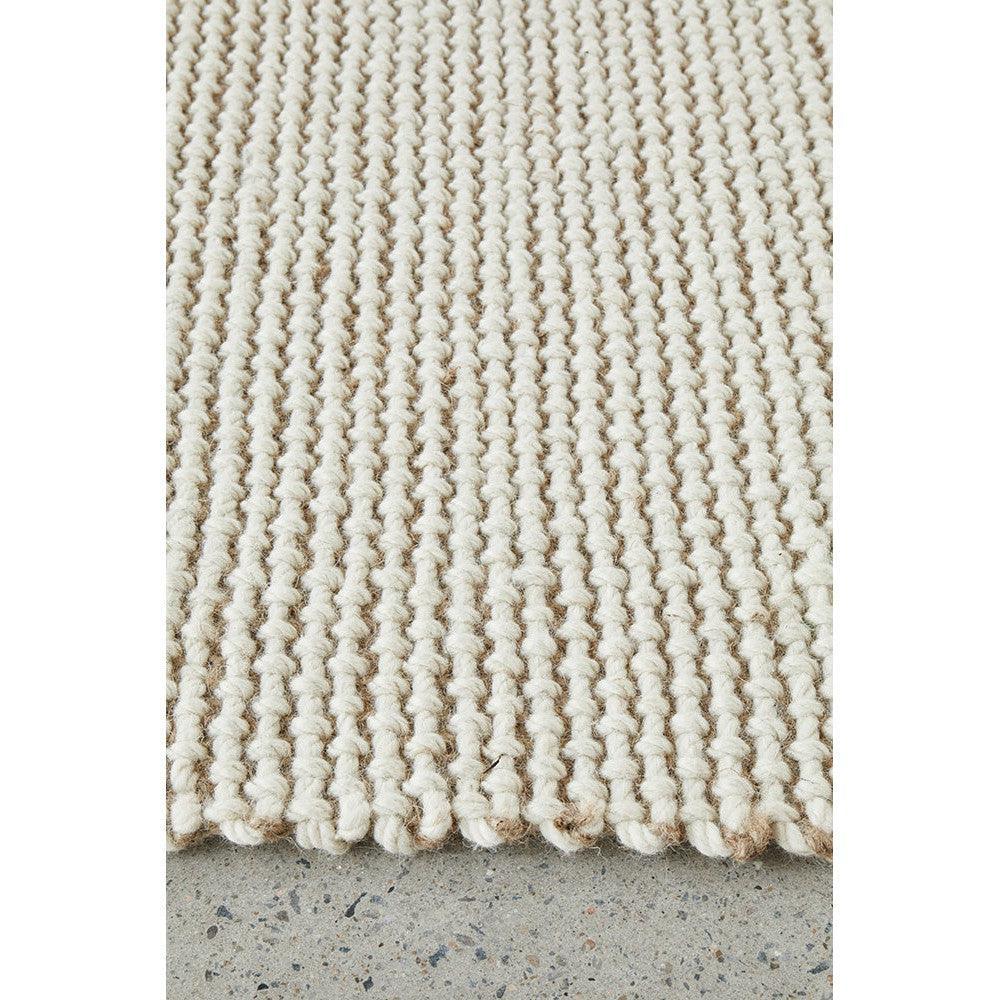 Harlow Cove Cream Rug featuring chunky looped textured weave in cream, ivory on light grey background, hand-tufted wool