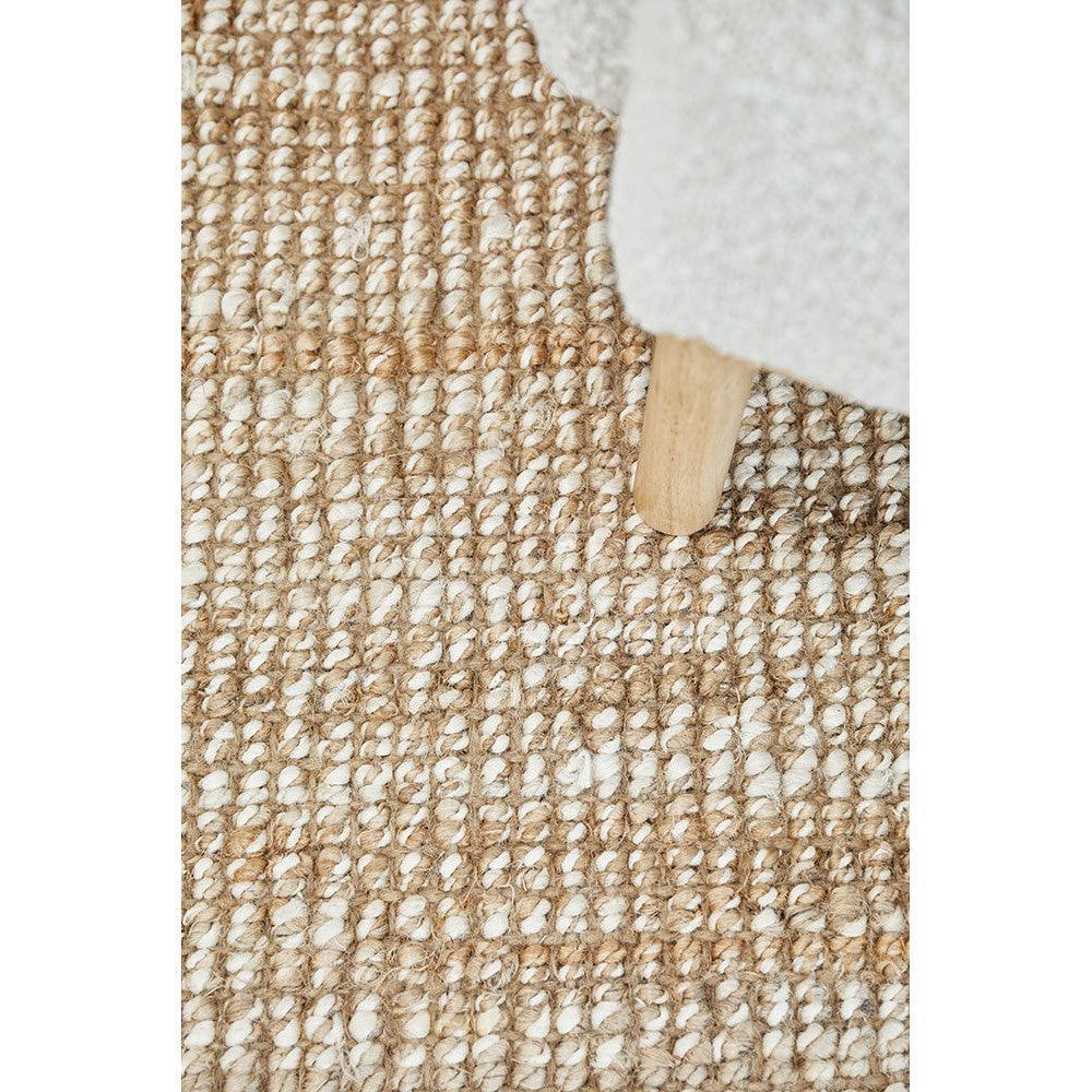 Harlow Hunter Natural Rug featuring woven loop texture in cream, beige and tan on natural backdrop, hand-woven jute rug