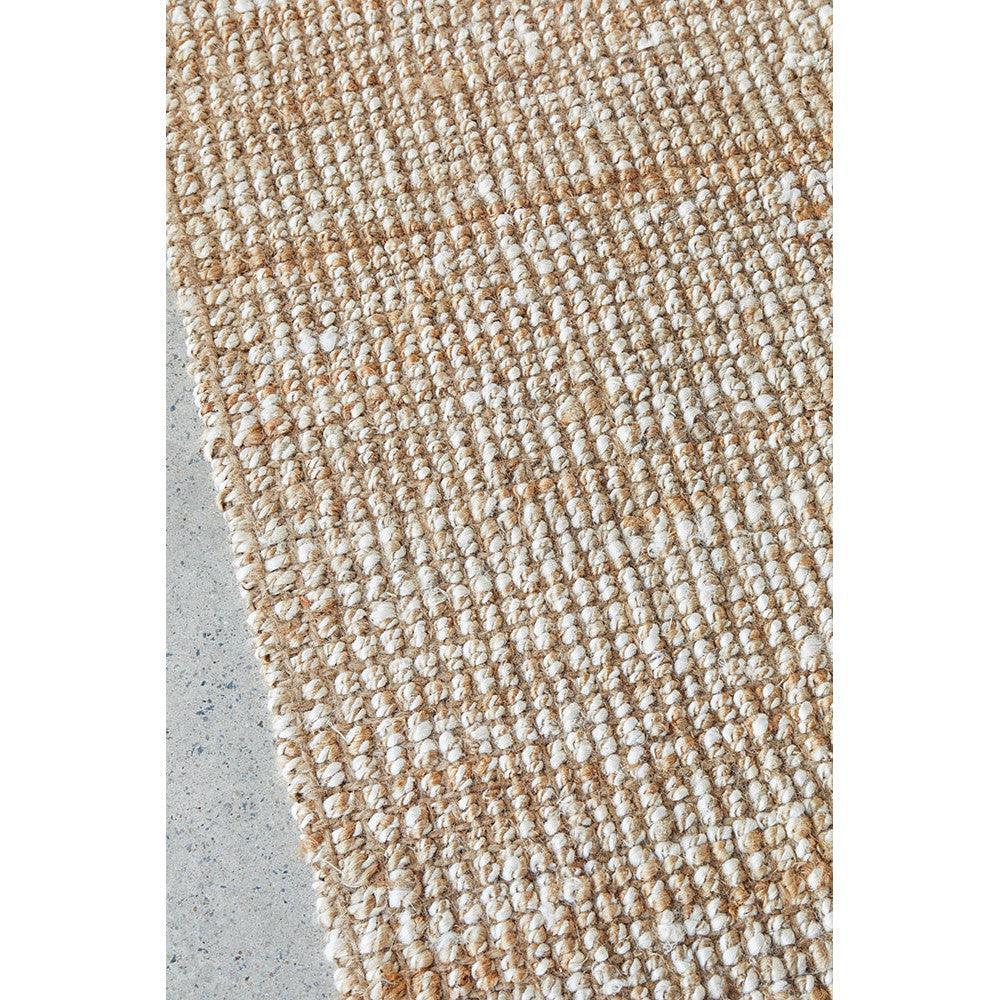 Harlow Hunter Natural Rug featuring chunky boucle weave in natural tan and cream on light background, hand-woven jute